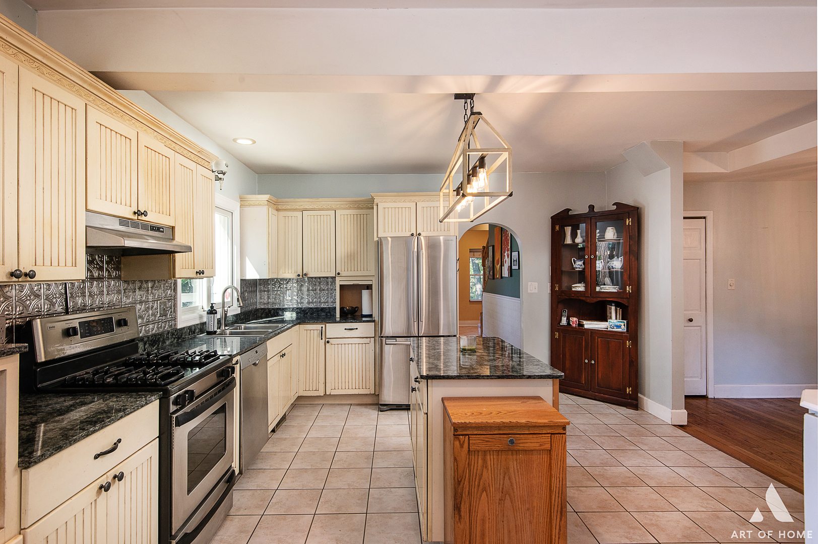 8813 Wolf Road Burr Ridge, IL 60527 - Photo 4 of 34 a kitchen with stainless steel appliances granite countertop a refrigerator and a stove top oven