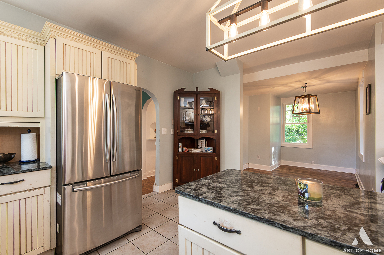 8813 Wolf Road Burr Ridge, IL 60527 - Photo 5 of 34 a kitchen with stainless steel appliances granite countertop a refrigerator a stove and a sink with large window