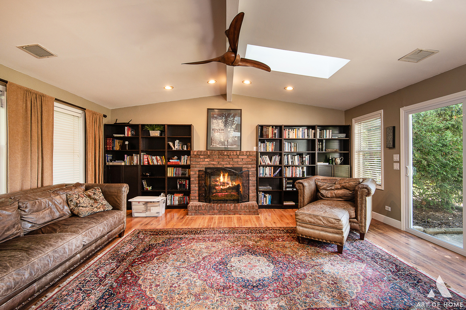 8813 Wolf Road Burr Ridge, IL 60527 - Photo 6 of 34 a living room with furniture and fireplace