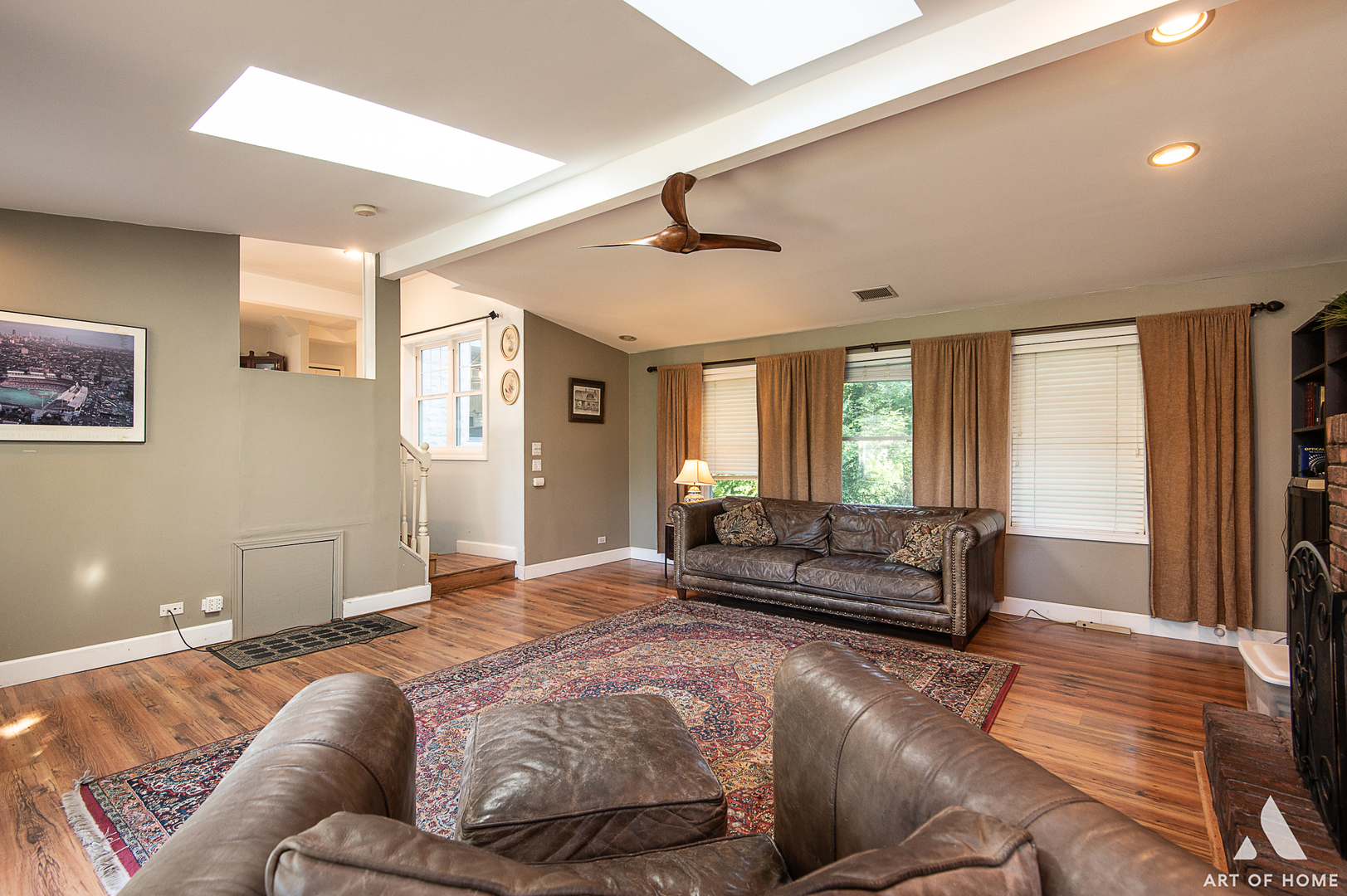 8813 Wolf Road Burr Ridge, IL 60527 - Photo 8 of 34 a living room with a couch and a window