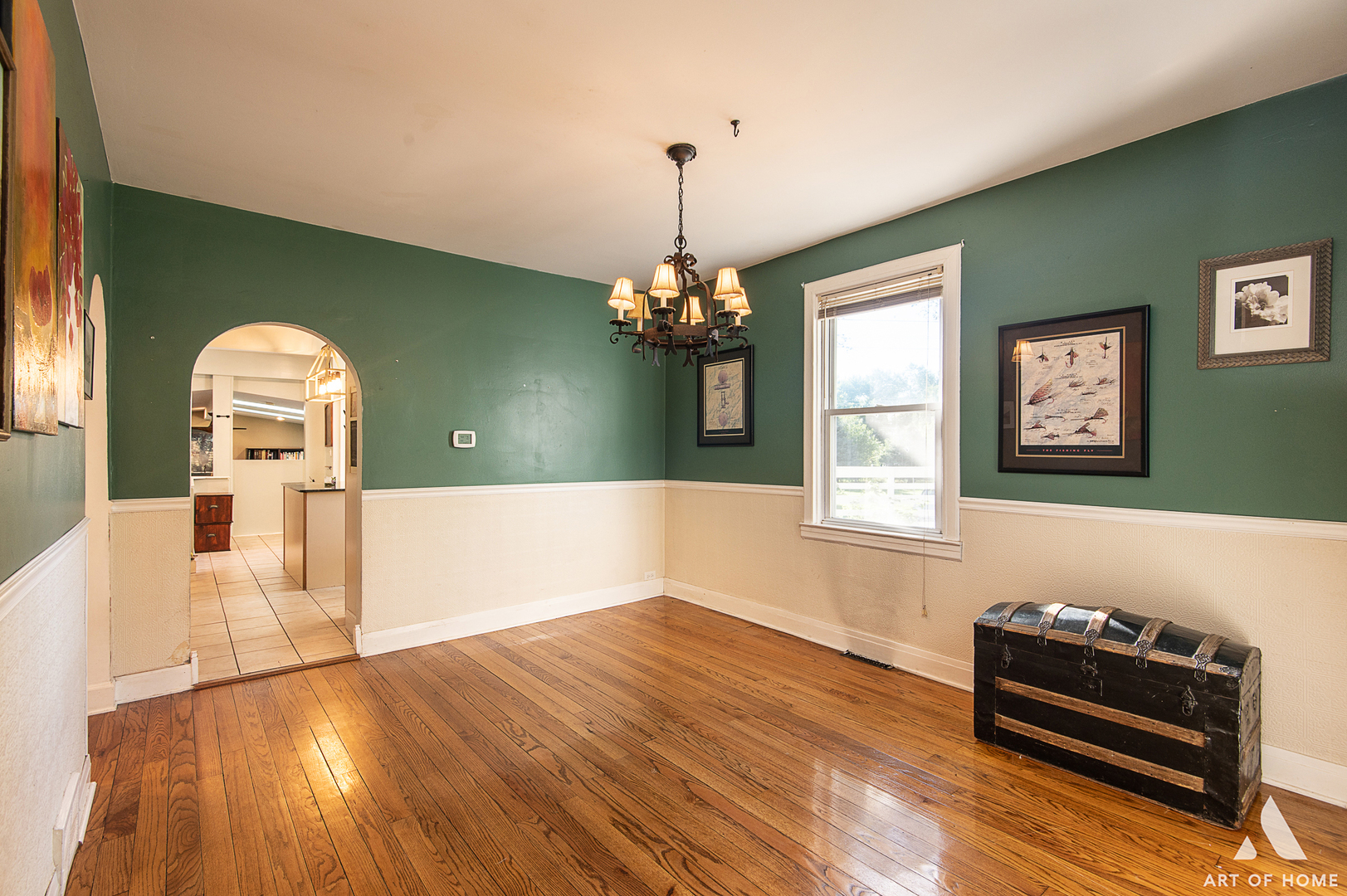 8813 Wolf Road Burr Ridge, IL 60527 - Photo 10 of 34 a living room with furniture and a chandelier