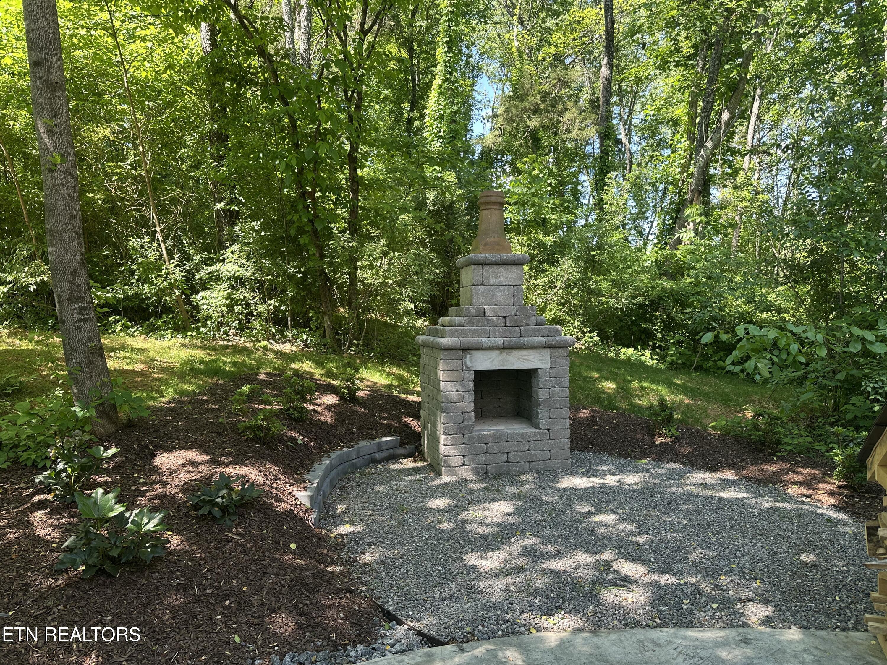 970 Douglas Dam Road Kodak, TN 37764 - Photo 4 of 49 Stone Outdoor Fireplace