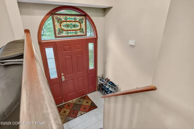 a view of an entryway with a window