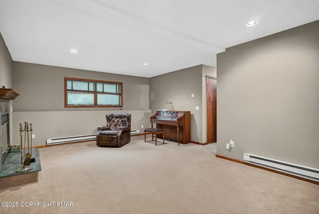 a room with furniture and a chandelier