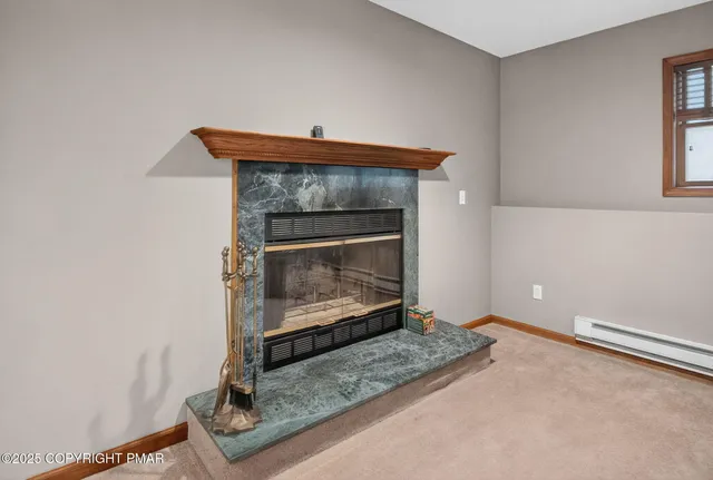 a living room with a fireplace