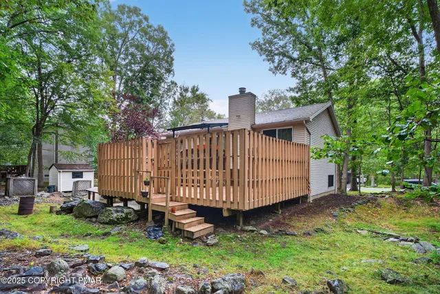 a view of a backyard with a garden