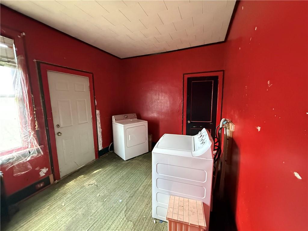 12 Connor Street Uniontown, PA 15401 - Photo 12 of 15 a bathroom with a sink toilet and mirror