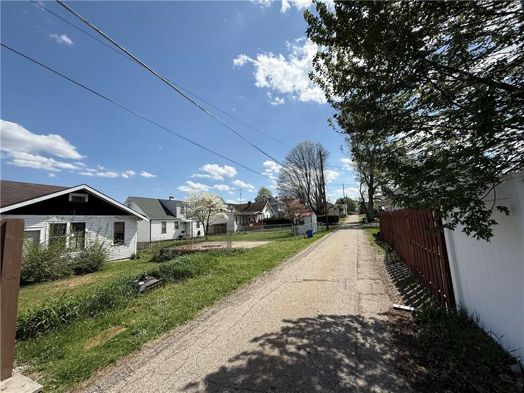 12 Connor Street Uniontown, PA 15401 - Photo 3 of 15 a front view of a house with a yard and trees