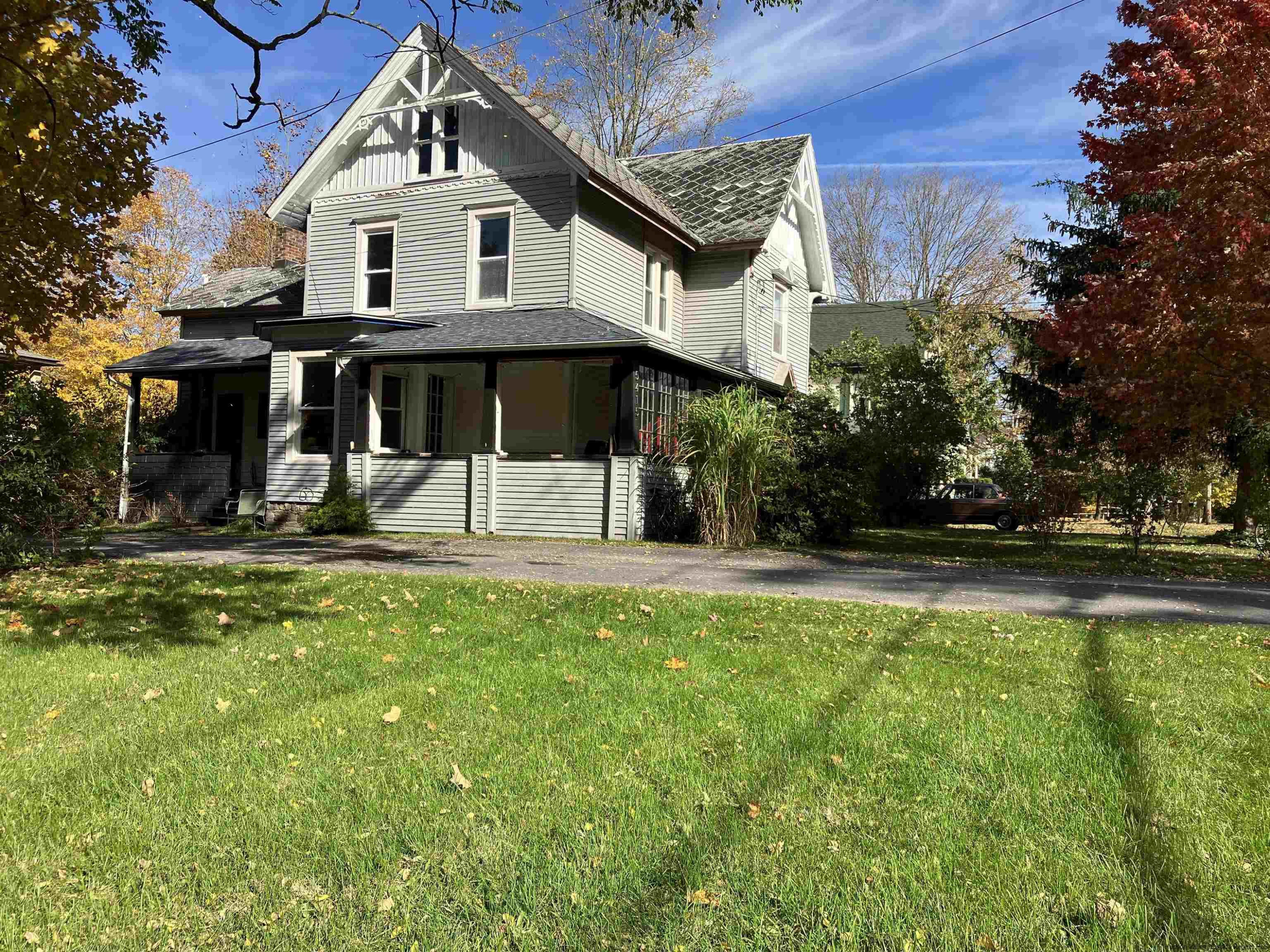 54155 Main Street Roxbury, NY 12474 - Photo 19 of 20 a view of a white house with a yard