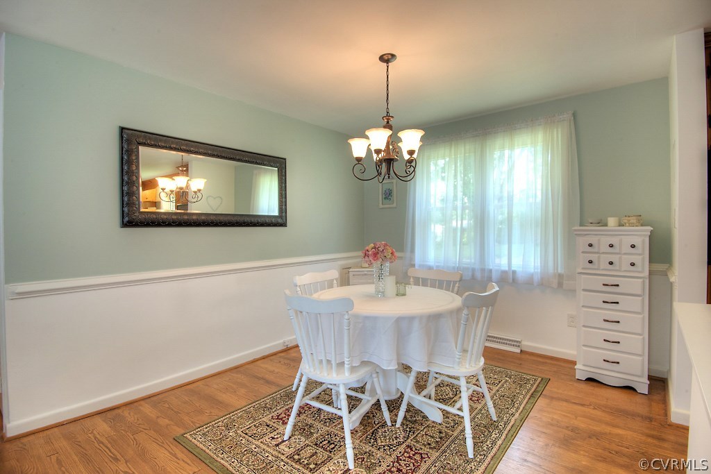 7516 Comet Road Henrico, VA 23294 - Photo 10 of 37 Formal Dining Room, Hardwoods, Chandelier