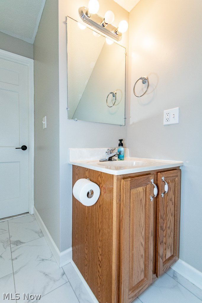 1314 Mayfield Ridge Road Cleveland, OH 44124 - Photo 19 of 40 Bathroom with vanity and tile patterned flooring
