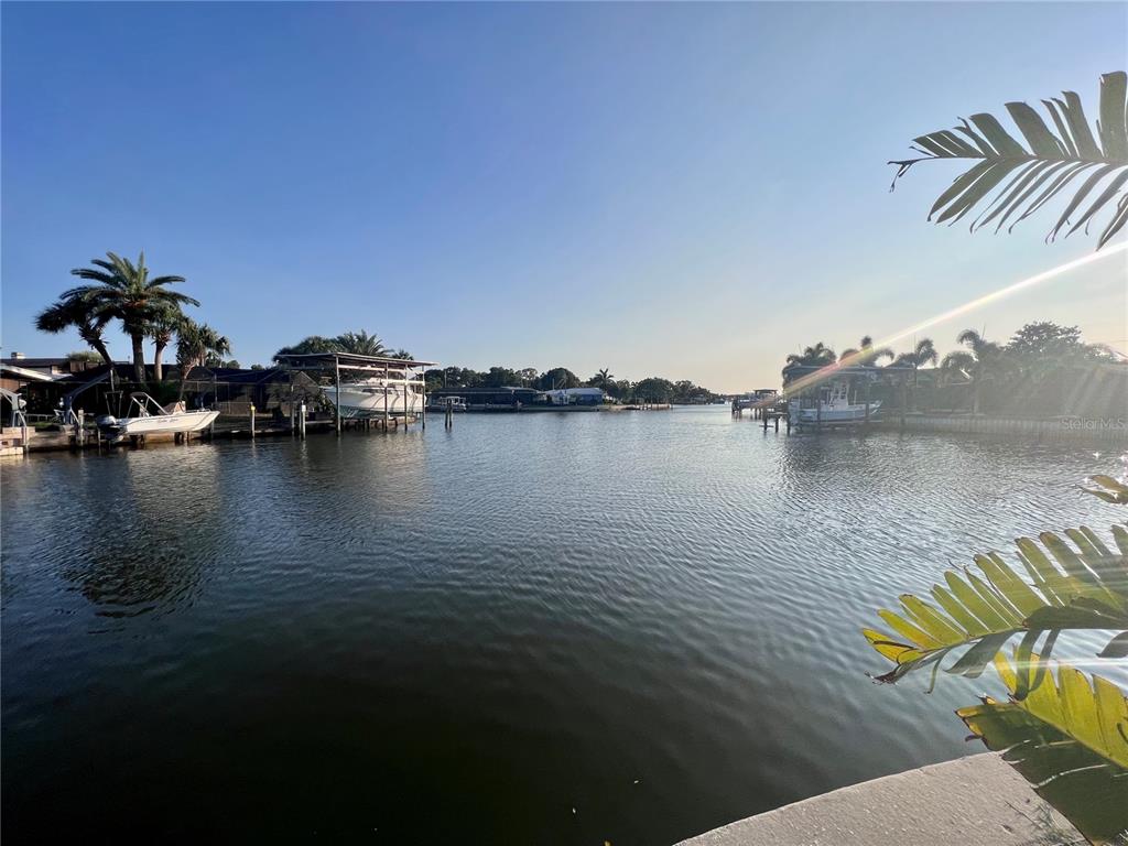 1796 Brookside Boulevard Largo, FL 33770 - Photo 2 of 7 a view of a lake with houses