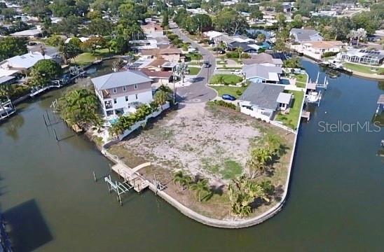 1796 Brookside Boulevard Largo, FL 33770 - Photo 7 of 7 an aerial view of a house with a lake view