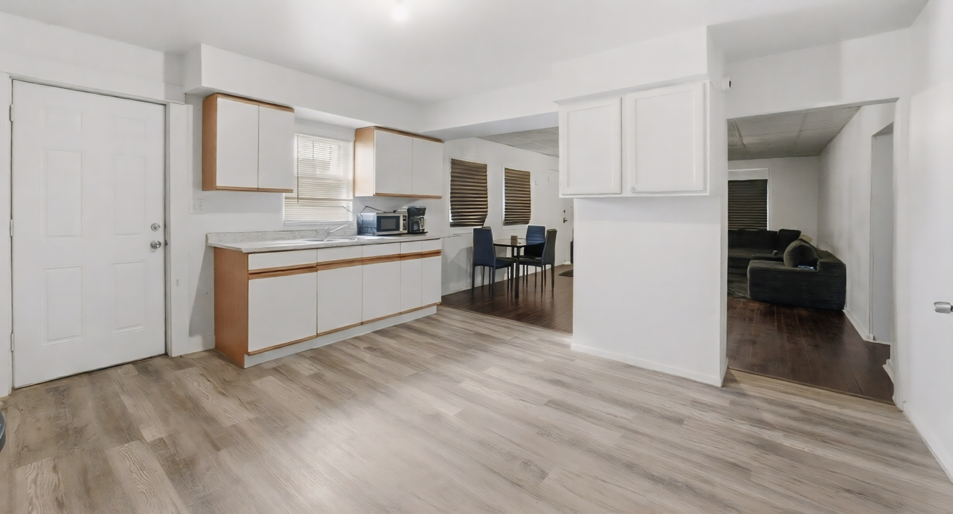 11735 South Indiana Avenue Chicago, IL 60628 - Photo 5 of 26 a kitchen with stainless steel appliances granite countertop a refrigerator and a stove top oven