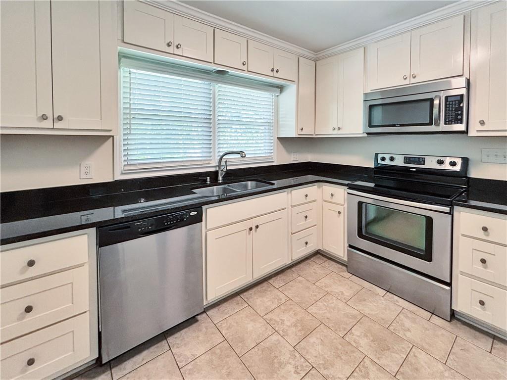 6058 Harleston Road Northeast Atlanta, GA 30328 - Photo 8 of 30