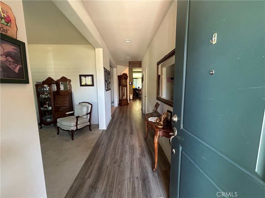 30099 Whembly Circle Menifee, CA 92584 - Photo 2 of 42 a living room with furniture and a wooden floor