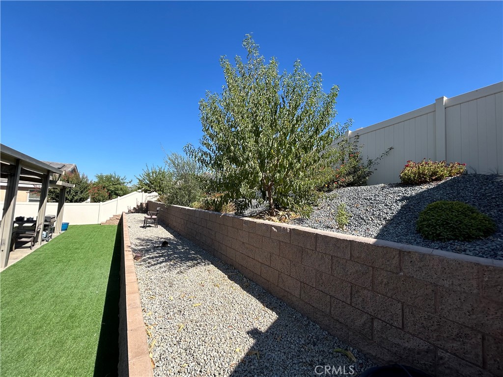 30099 Whembly Circle Menifee, CA 92584 - Photo 40 of 42 a view of a backyard