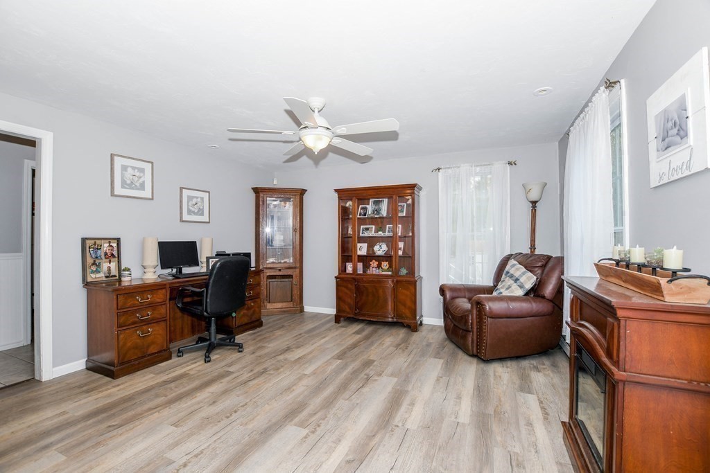 116 Tispaquin Street Middleboro, MA 02346 - Photo 14 of 37 a living room with furniture and wooden floor