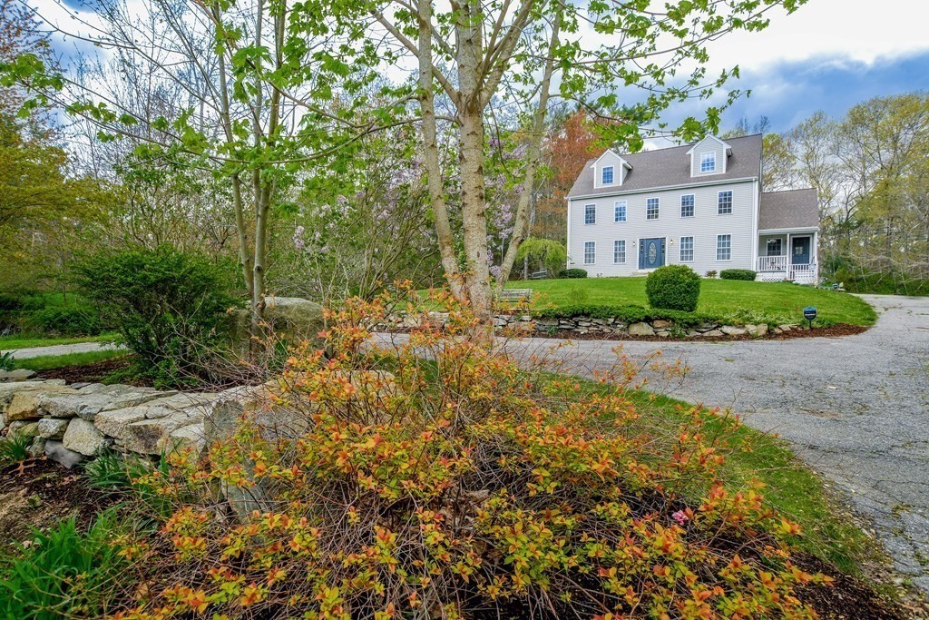 116 Tispaquin Street Middleboro, MA 02346 - Photo 2 of 37 a view of a street with a building in the background