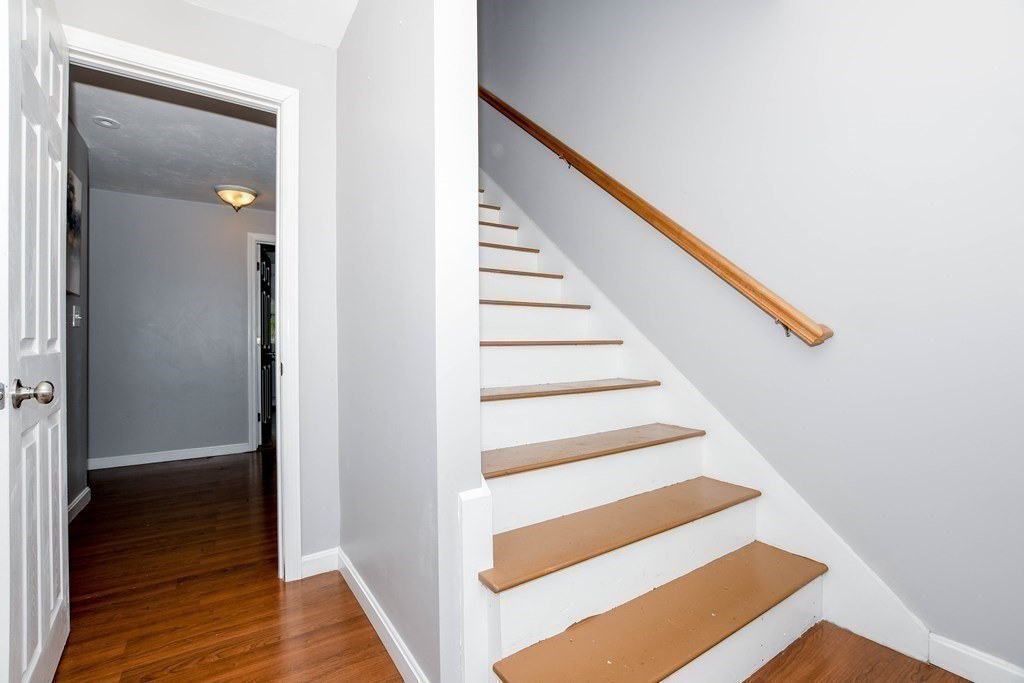 116 Tispaquin Street Middleboro, MA 02346 - Photo 26 of 37 a view of entryway with wooden floor
