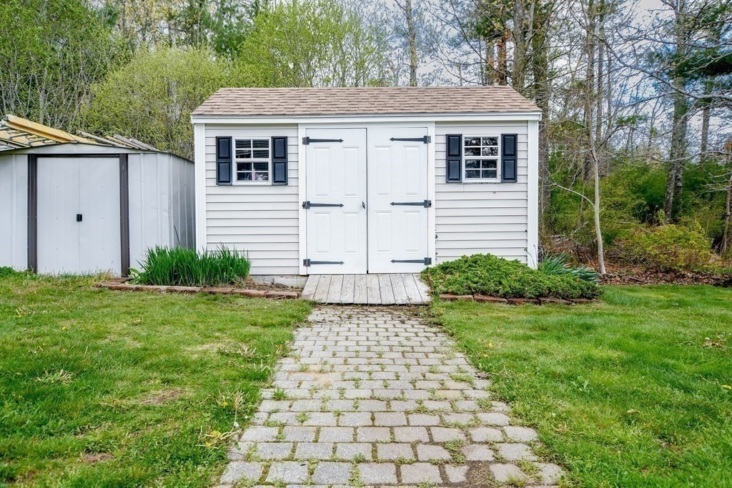 116 Tispaquin Street Middleboro, MA 02346 - Photo 37 of 37 a view of a back yard of the house