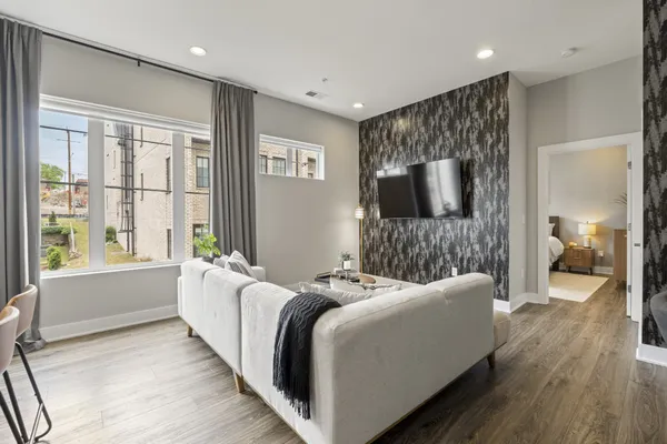 a living room with a couch and a flat screen tv
