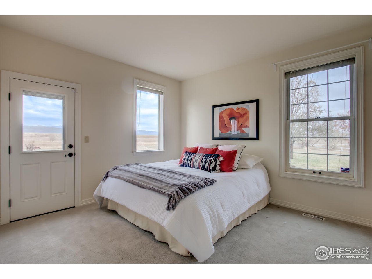 7401 Deerfield Road Longmont, CO 80503 - Photo 24 of 39 Main floor bedroom