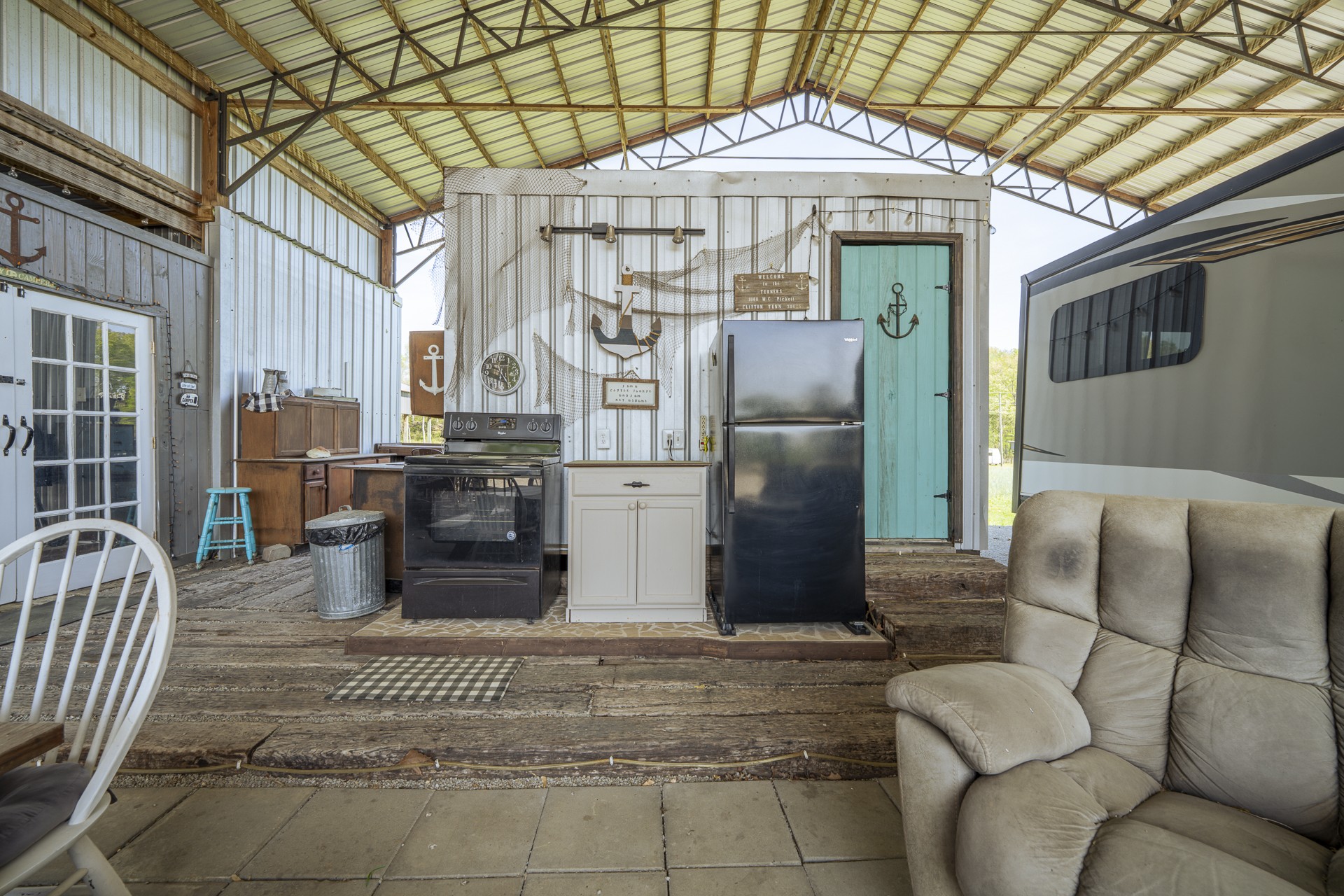 1008 WC PICKETT Road Clifton, TN 38425 - Photo 1 of 57 a view of a chairs in the patio