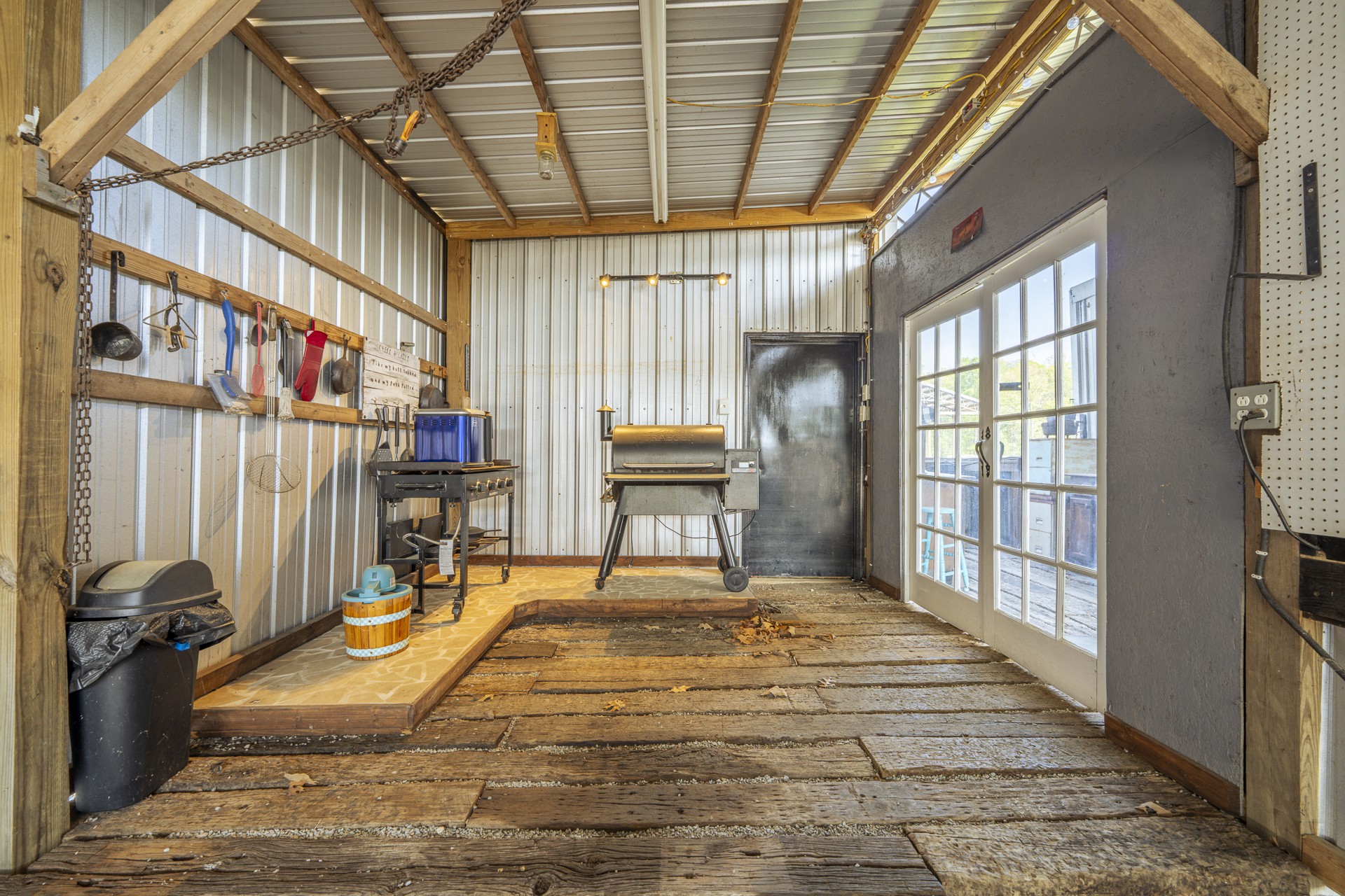 1008 WC PICKETT Road Clifton, TN 38425 - Photo 11 of 57 a bedroom with a bed and a large window with the outer view