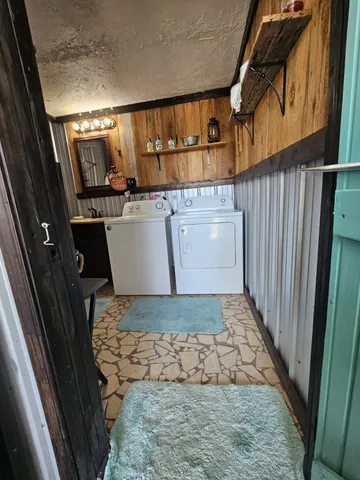 a front view of a building with sitting area