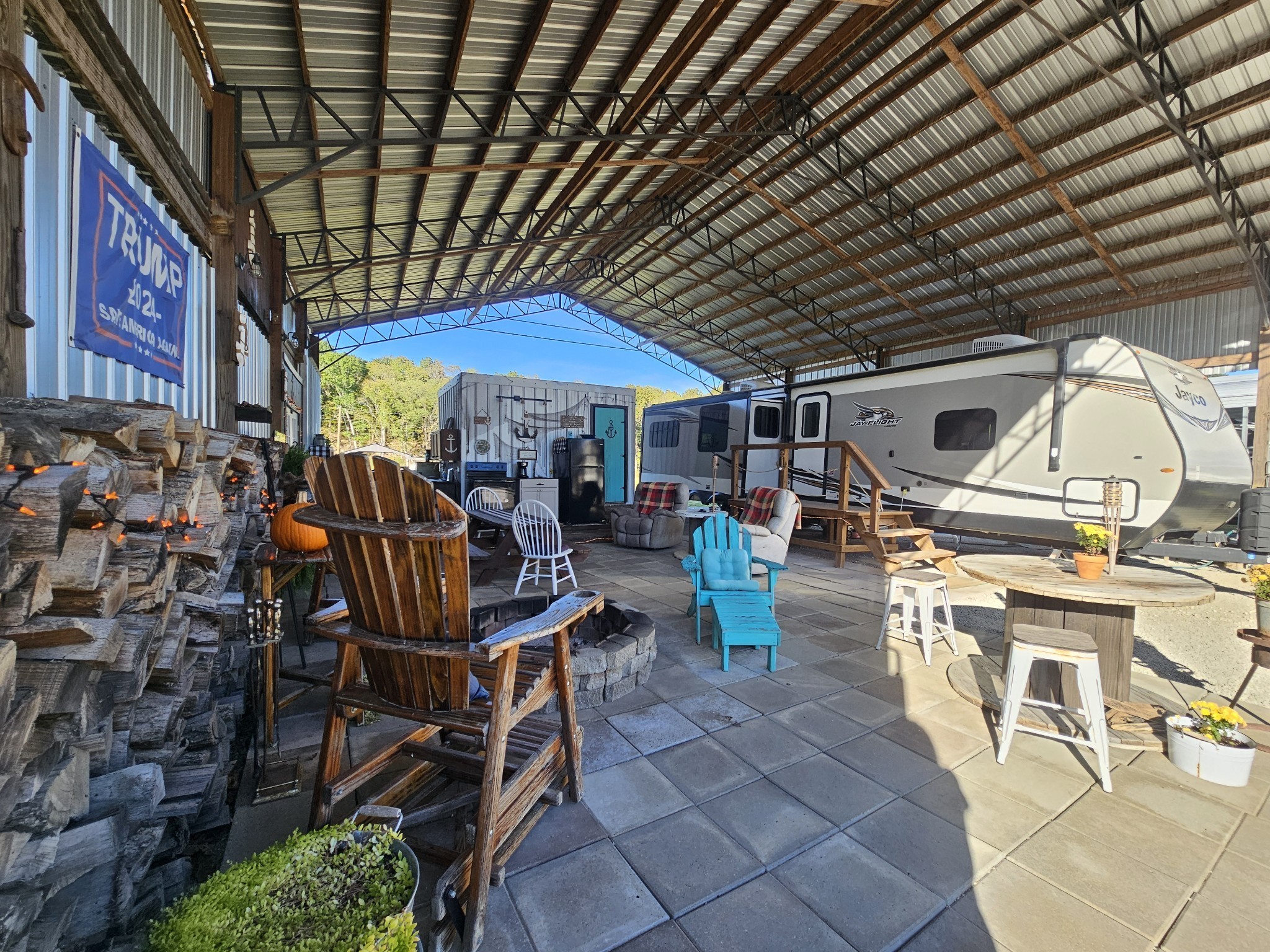 1008 WC PICKETT Road Clifton, TN 38425 - Photo 23 of 57 a view of a patio with table and chairs