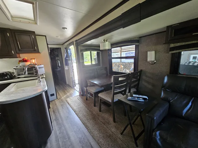 a bathroom with a toilet and a mirror