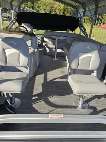 a sign broad in front of a house