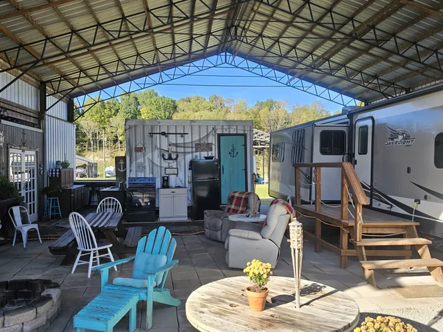 a kitchen with a refrigerator and a stove