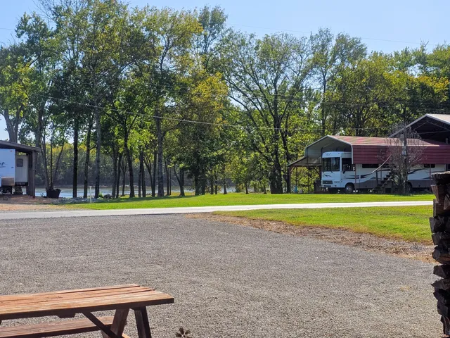 a view of an outdoor sitting area with brick walls