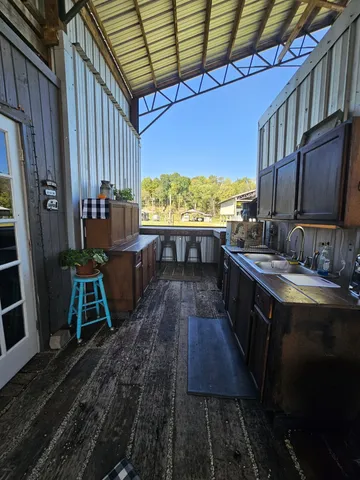 a bathroom with a sink and mirror