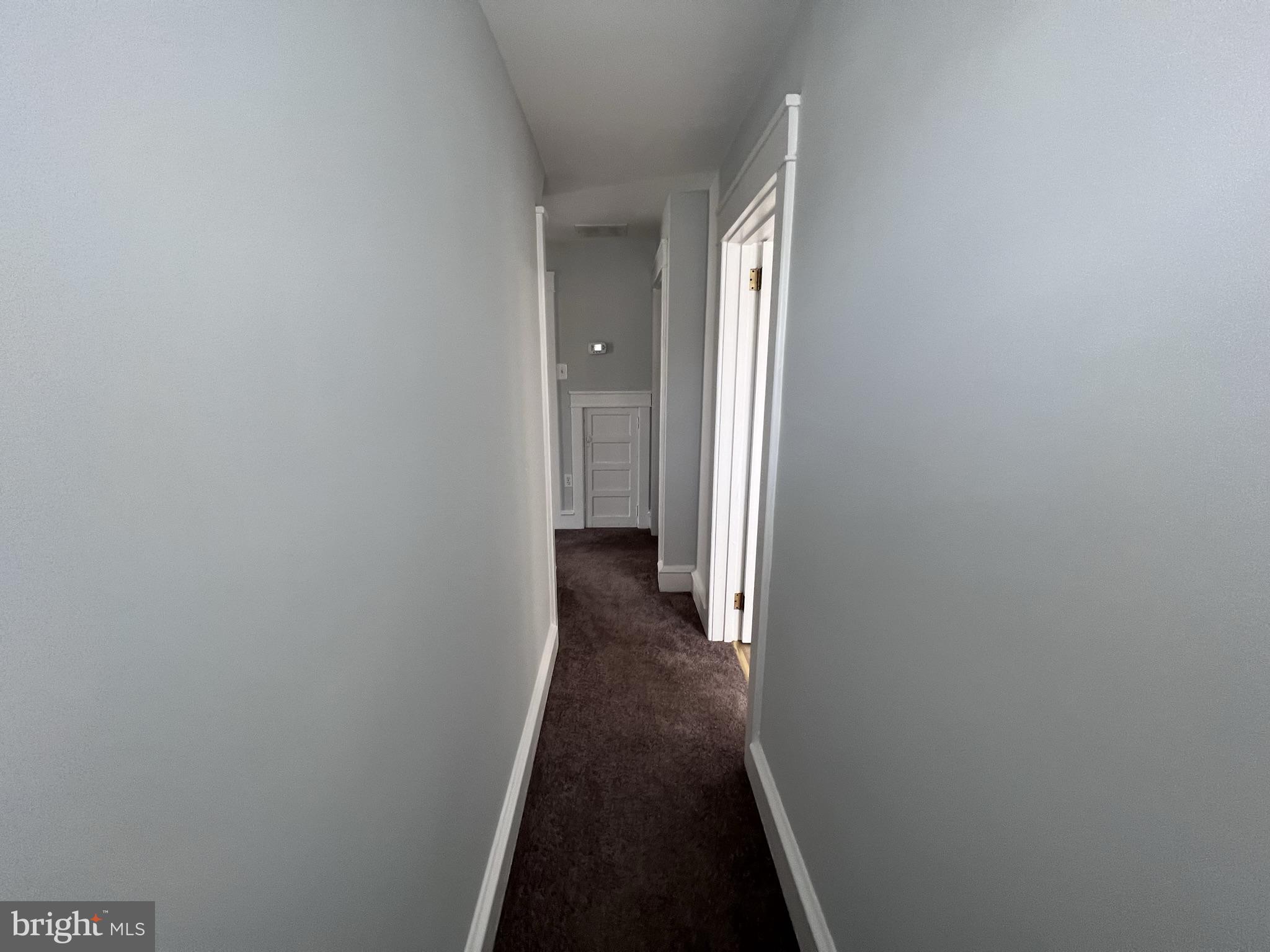 6 Montgomery Avenue, Unit 2 Glenside, PA 19038 - Photo 16 of 27 a view of a hallway with a wooden floor