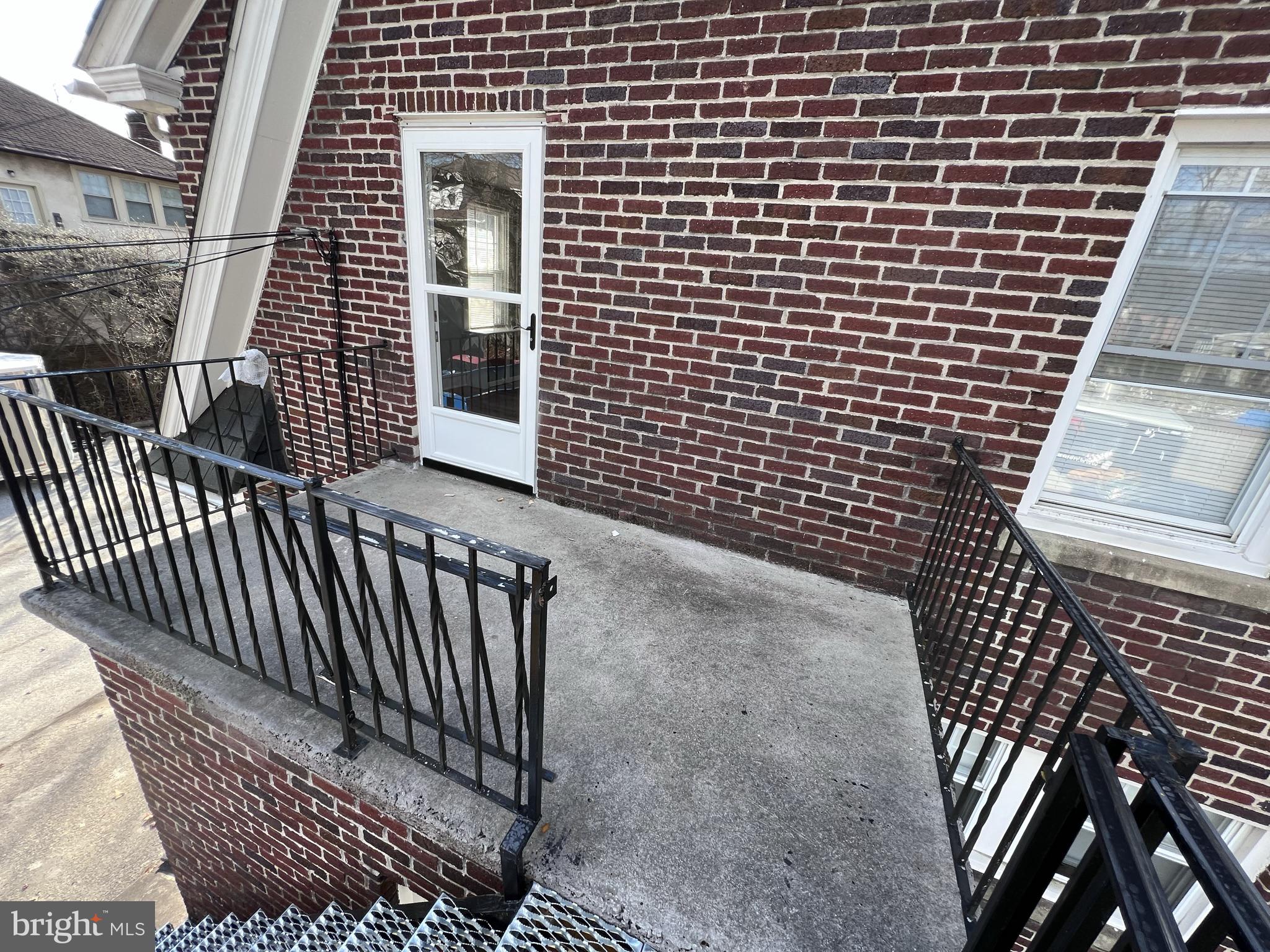 6 Montgomery Avenue, Unit 2 Glenside, PA 19038 - Photo 3 of 27 a view of a brick wall