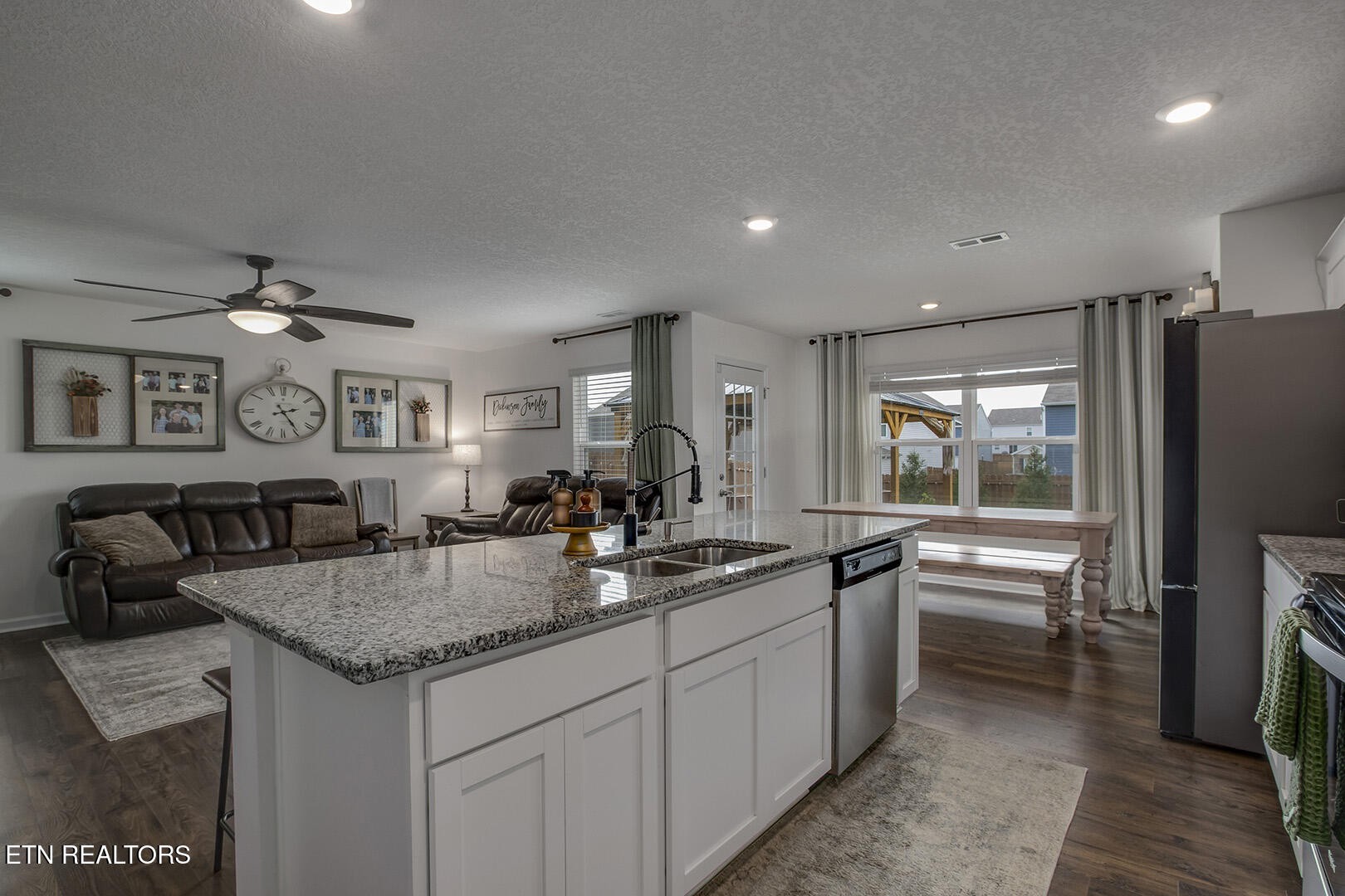 7519 Game Bird Street Corryton, TN 37721 - Photo 16 of 50 a kitchen with center island and stainless steel appliances