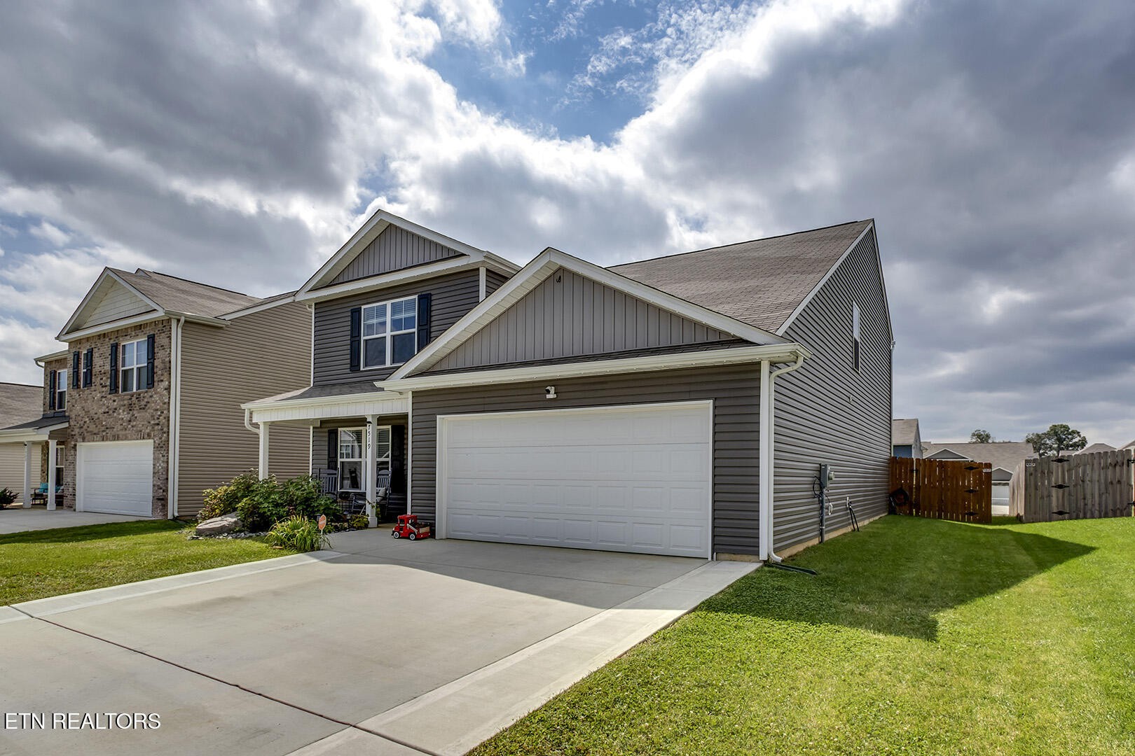 7519 Game Bird Street Corryton, TN 37721 - Photo 3 of 50 a front view of house with yard and green space