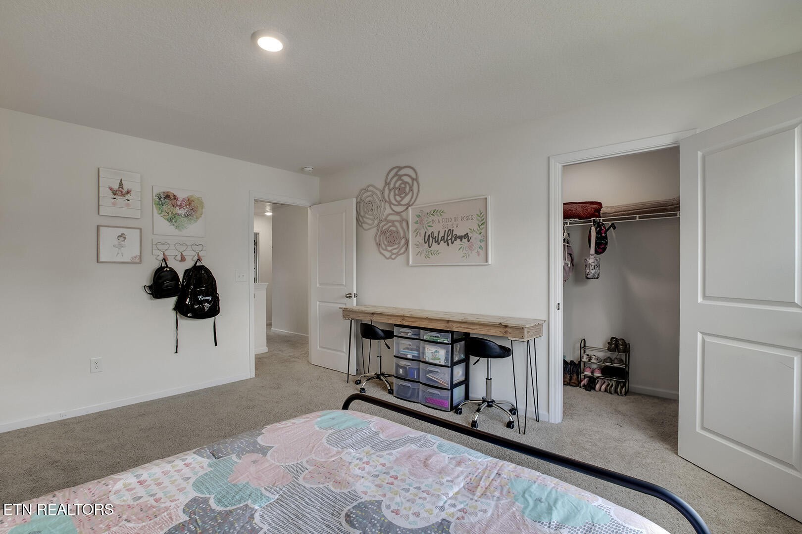 7519 Game Bird Street Corryton, TN 37721 - Photo 32 of 50 a bedroom with furniture and a chandelier