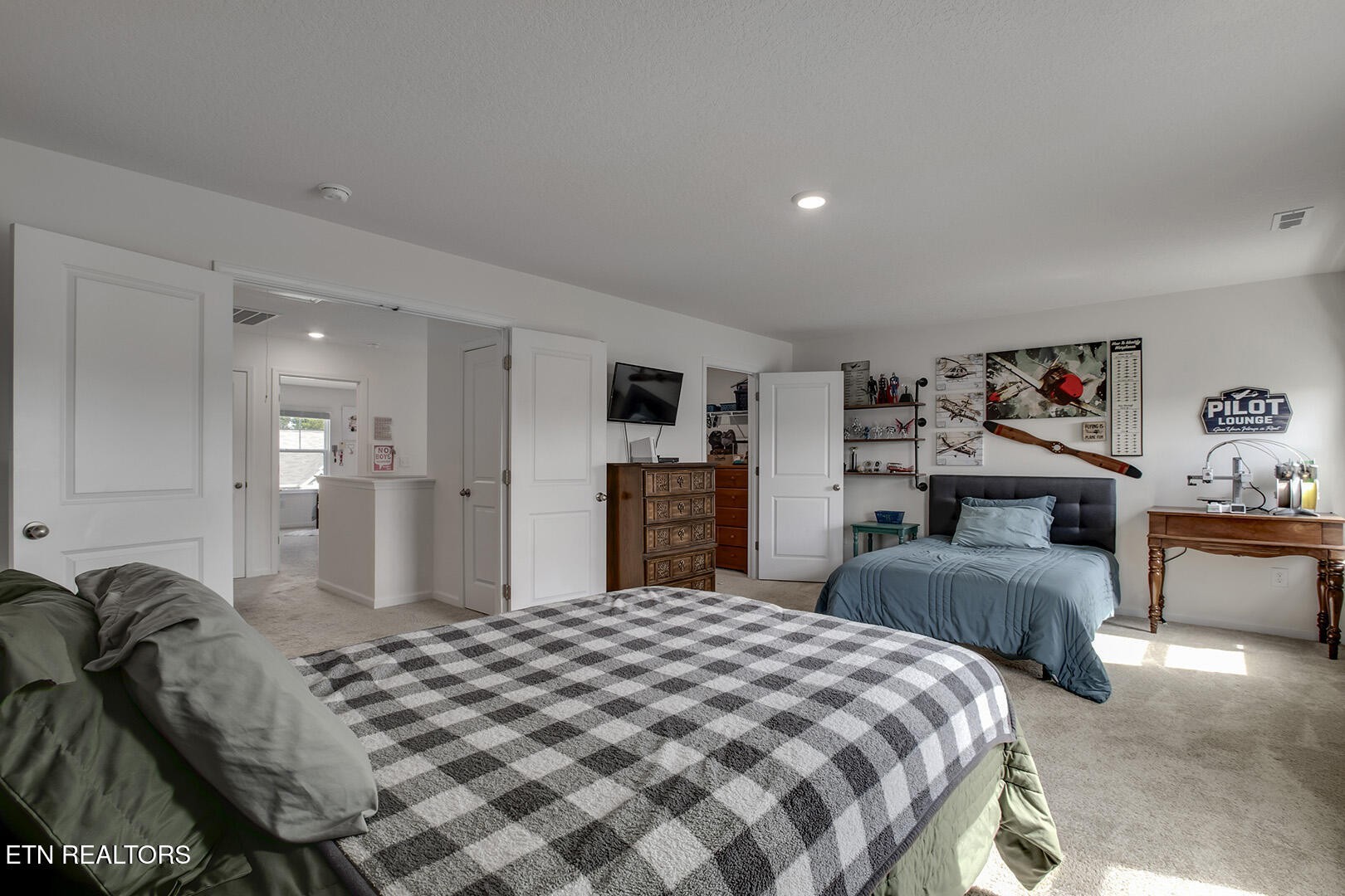 7519 Game Bird Street Corryton, TN 37721 - Photo 36 of 50 a bedroom with a bed and ceiling fan