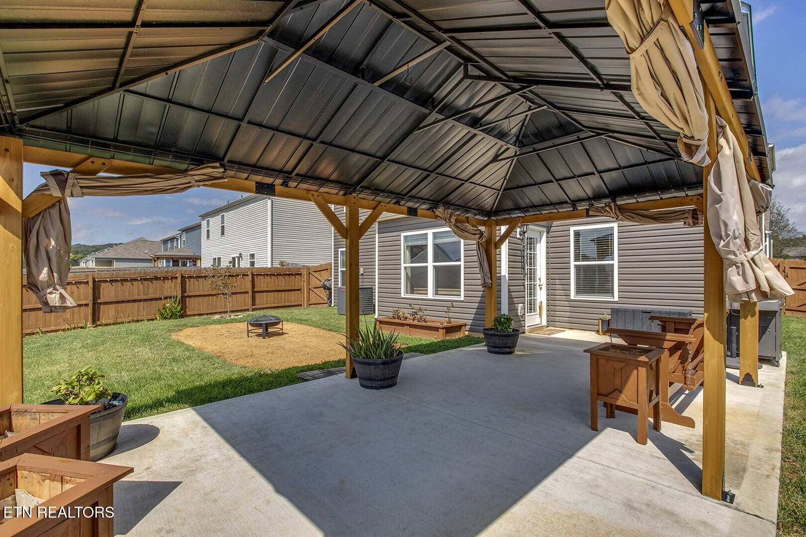 7519 Game Bird Street Corryton, TN 37721 - Photo 46 of 50 a view of a backyard with sitting area