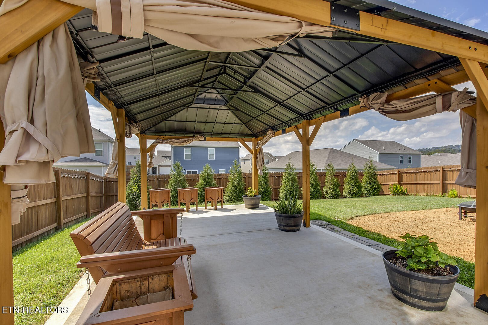 7519 Game Bird Street Corryton, TN 37721 - Photo 47 of 50 a view of patio with table and chairs potted plants