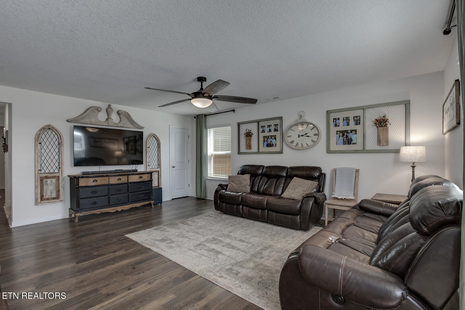 7519 Game Bird Street Corryton, TN 37721 - Photo 7 of 50 a living room with furniture and a flat screen tv