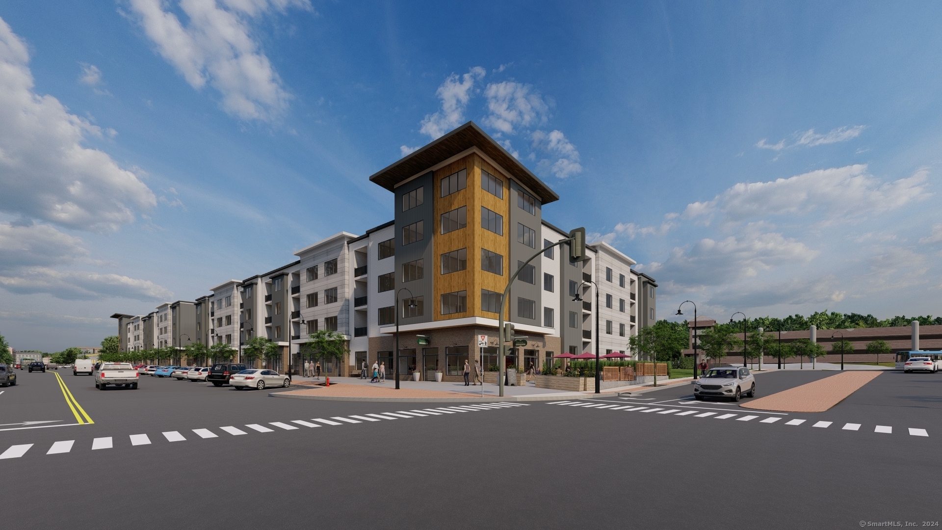 130 North Main Street, Unit 315 Bristol, CT 06010 - Photo 1 of 1 a view of a tall building next to a road