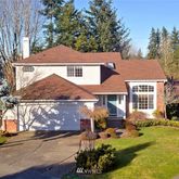 a view of a yard in front of a house