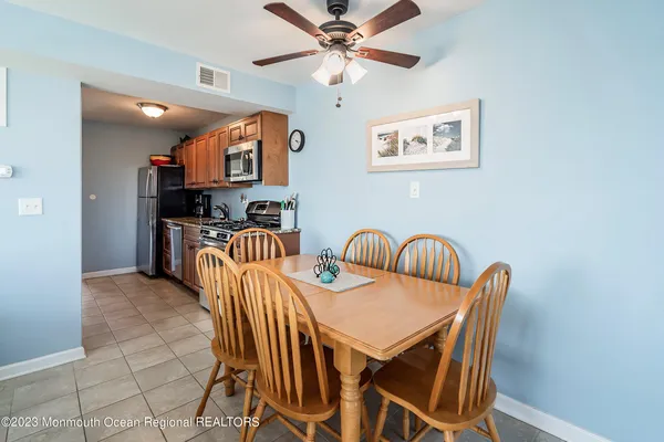 a view of a dining room with furniture
