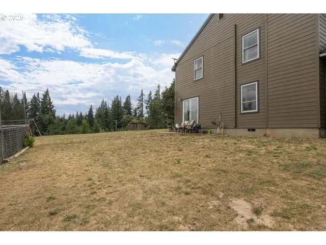 a view of backyard with outdoor space