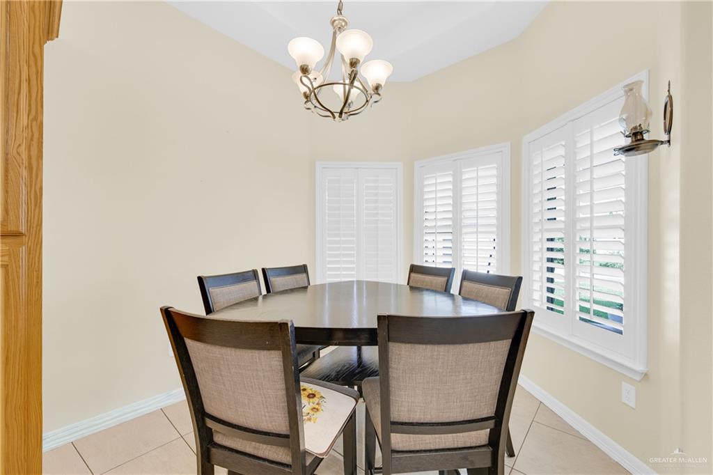 305 North 15th Street Hidalgo, TX 78557 - Photo 13 of 28 a view of a dining room with furniture window and outside view